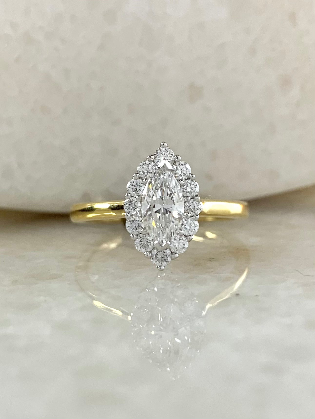 Marquise cut halo on sale diamond engagement ring